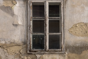 Windows 3.0 / Tiled wooden window on an old building
