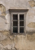 Windows 3.0 / Tiled wooden window on an old building